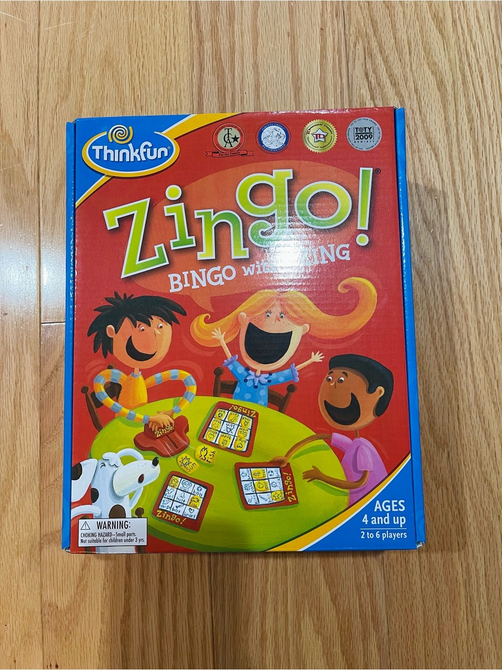Zingo Board Game Bingo with a Zing! - Red, Blue, Yellow, Green